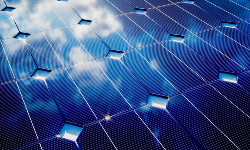 Photovoltaic with cloudy sky reflection